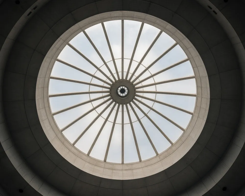 Editorial photograph of a dome skylight from below